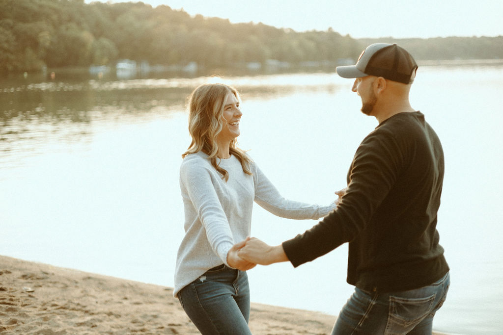 Stillwater, Minnesota Engagement Photos with Couple on a Beach