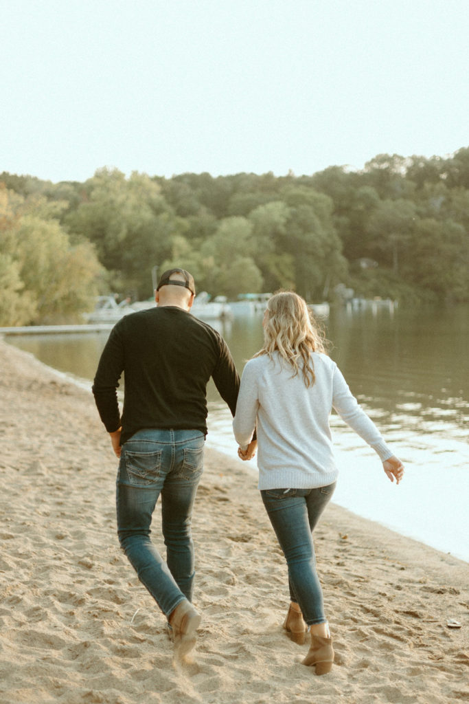 Stillwater, Minnesota Engagement Photos with Couple on a Beach