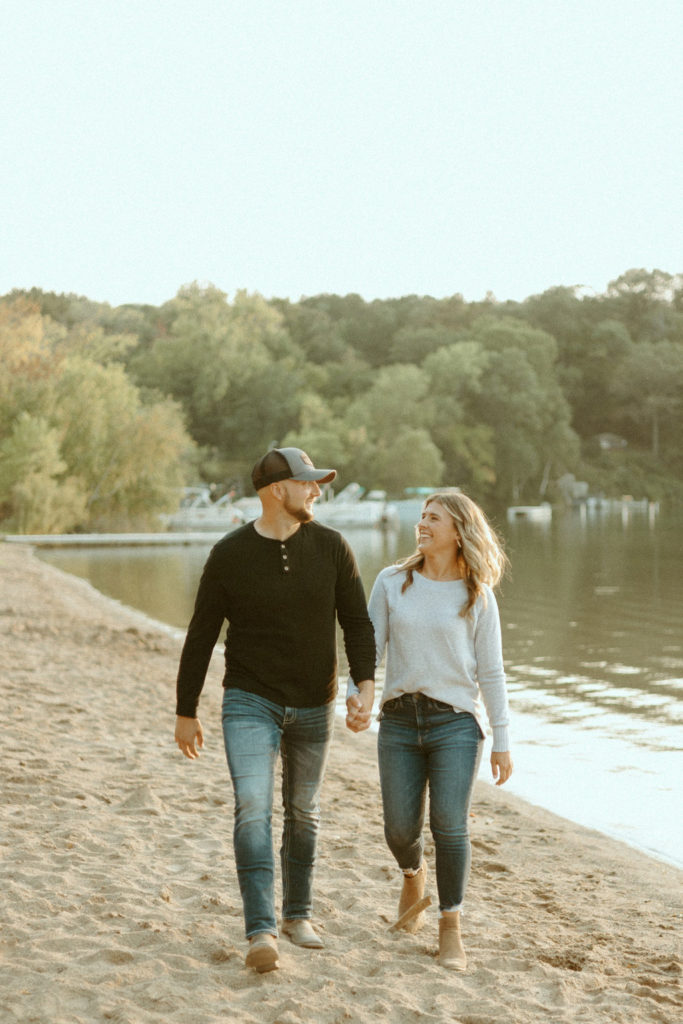 Stillwater, Minnesota Engagement Photos with Couple on a Beach