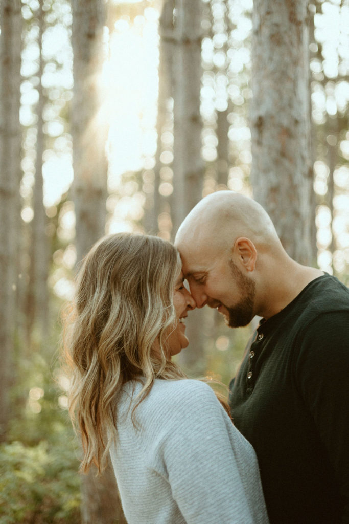 Stillwater, Minnesota Engagement Photos with Couple in Tall Pines
