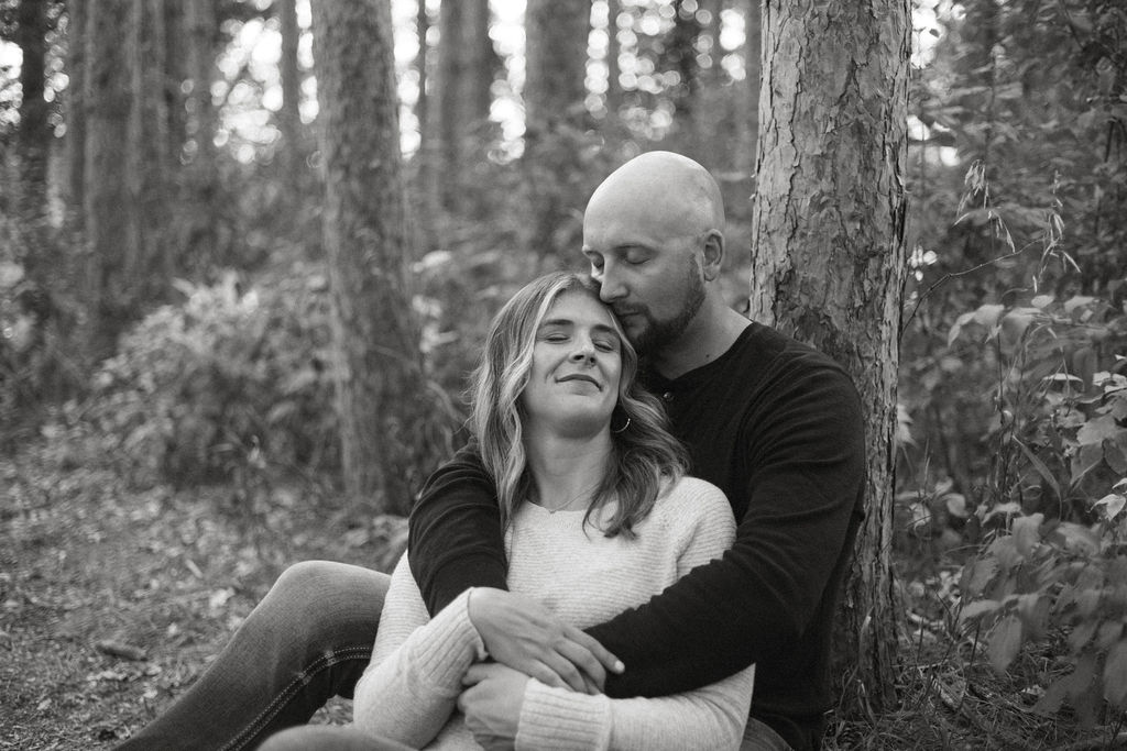 Stillwater, Minnesota Engagement Photos with Couple in Tall Pine Trees